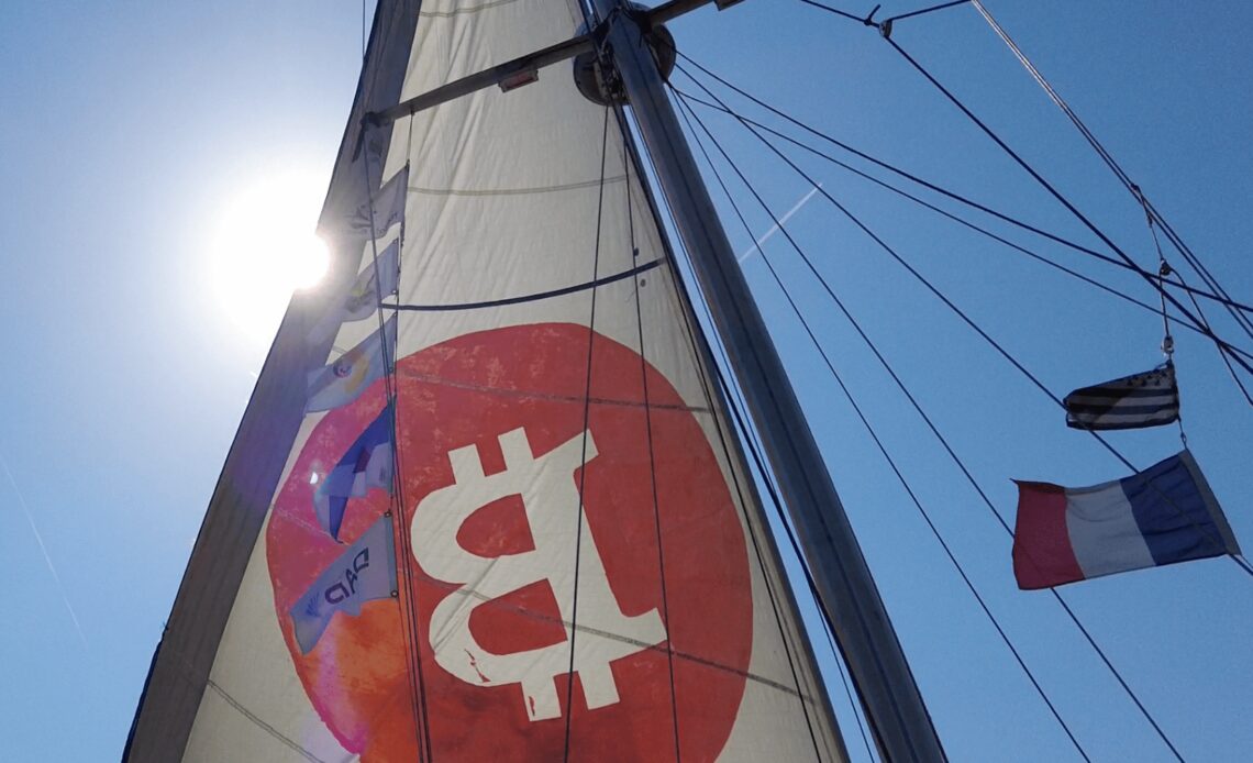 sailor paints giant 'B' on boat to promote crypto across the ocean